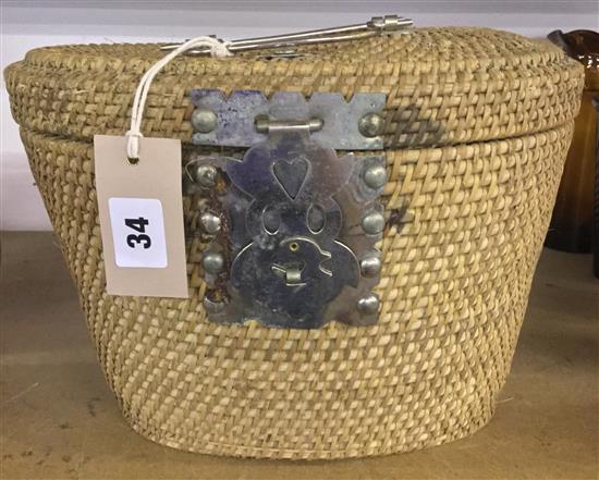 Chinese blue and white tea caddy and bowls in a basket